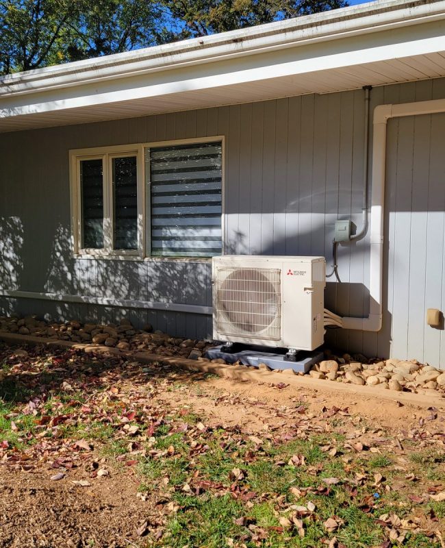 Mitsubishi three-zone ductless mini split outdoor unit with line hide on a ranch-style home in Pikesville, MD